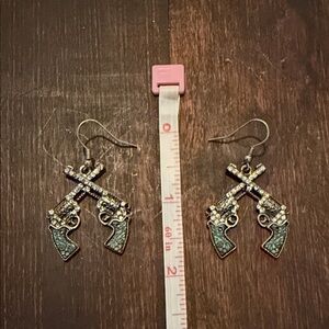 Gun-Shaped Earrings with Green Accents